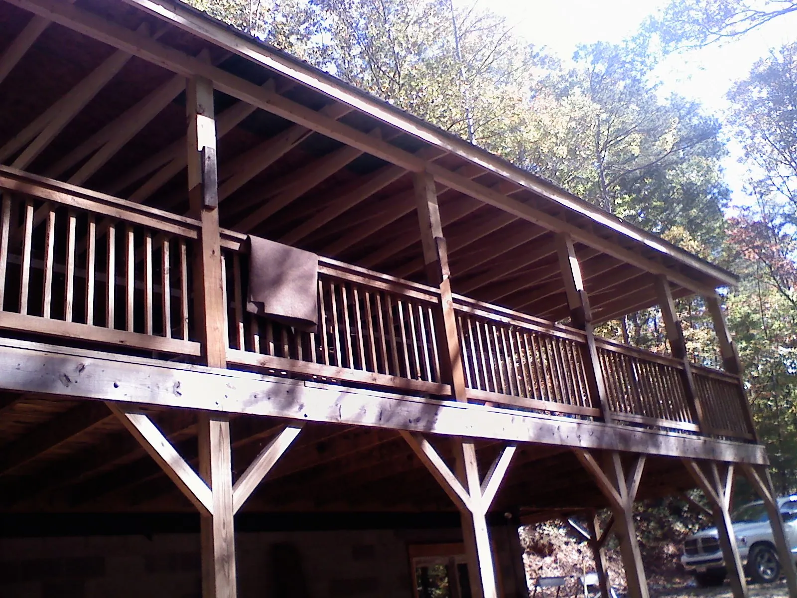 Timber framing under a new elevated porch and deck — Roof Leak Repair in Rockville by Roofing Brothers